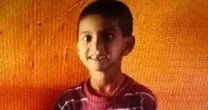 Boy, 6, thrown into crocodile-infested river by mum smiles in last photo before being mauled to death