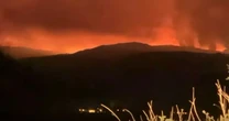Extreme wildfire warning issued after blaze as UK bakes in scorching temperatures