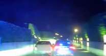 Moment sparks fly as gas canisters thrown at cops from 'stolen car' during 135mph police chase