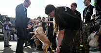 Prince William makes cheeky Aston Villa quip as excited dog leaps on him