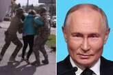 Putin's forces arrest woman in broad daylight for 'spying for the enemy' as locals watch on