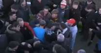 Moment youth rugby match descends into chaos as teen players throw punches on the pitch