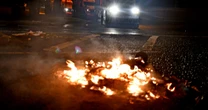 Petrol bombs thrown and cars set alight in third night of violence in Northern Ireland