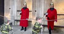 Heartwarming moment King's Guard breaks protocol to charm 8-year-old blind boy