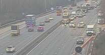 M23 closes after huge multi-vehicle crash involving cars and a lorry as traffic at standstill