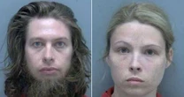 Couple arrested on bestiality charges after woman, 26, 'has sex with the family dog multiple times'