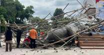 Terrifying moment 29ft Buddha statue topples over killing monk and injuring 5 others