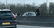 BREAKING: M1 chaos as man runs into oncoming traffic chased by police officers