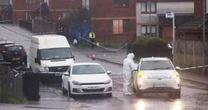 Body found in field with three men arrested as forensic cops comb street
