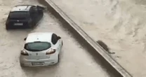 Spain hit by storm and hail warning as cars underwater after torrential rain