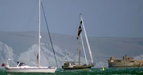 Kite surfer dies after being ‘blown into the side of a yacht’ at popular UK beach