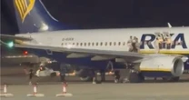 Ryanair fire: 18 people injured after blaze on plane at Palma airport as passengers flee