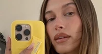 Hailey Bieber made a new hands-free way to hold the Rhode lip balm - but fans are divided
