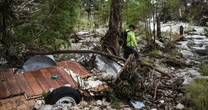 Texas floods miracle as two missing girls 'found alive clinging to 30ft tree'