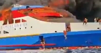 LiveIndonesia boat fire LIVE: Passengers jump into sea as vessel bursts into flames