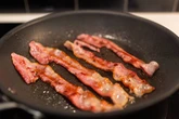 Fry-up lover who ate undercooked bacon ended up with pork worms in his brain