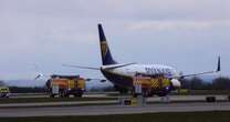 Ryanair plane surrounded by fire engines at Manchester Airport after forced emergency landing