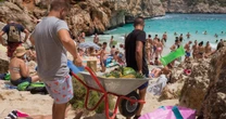 Balearic Islands ban influencers after cove is swamped by 4,000 tourists