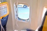Ryanair flight chaos as man 'sucked out of window' as wife 'holds onto his legs'