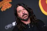 Mum of Dave Grohl's lovechild reveals identity as she says fans are 'really angry'