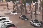 Brit holidaymakers warned as Canary Island plunges underwater and mud flushes away cars