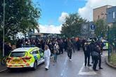 Manchester school 'triple stabbing' as police give ages of victims after girl arrested