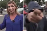 Sky News reporter forced off-air as masked mob make foul-mouthed rant on live TV