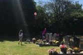 Mum's captures chilling moment 'baby's spirit returns to put a balloon on her grave'