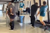 NFL fans throw haymakers as beer-bellied man's trousers fall down during stadium brawl