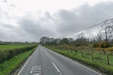 Driver killed and two rushed to hospital after two-car crash as police swarm scene