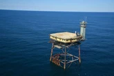 Rusty steel tower above shark-infested sea dubbed 'world's most dangerous' hotel