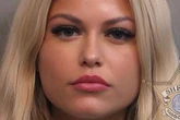 Glam 'Barbie goes to jail' mugshot goes viral as men offer to pay her bail