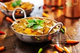 Brits get post pub health boost as spicy curries help you vinda-lose weight, experts say