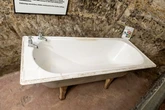 Serial killer's 'death bath' where six victims bodies were dismembered