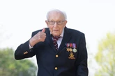 Terrifying Captain Tom memorial still standing guard as people 'celebrate'