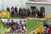Football hooligans launch barriers at each other as police forced to stop violent clashes