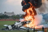 25 children among dead in horror plane crash as scorched bodies pulled from building