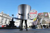Fans chase giant Top Hat across London in real-life Monopoly game to celebrate 90 years