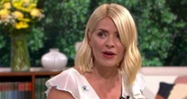 Terrified Holly Willoughby squeals as Phillip Schofield teases her with creepy doll