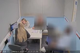 Sick nursery worker Rosksana Lecka smirks at police while being quizzed about harming babies