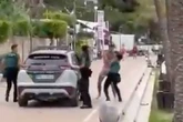 Tourist 'beaten by Ibiza police' after shadow boxing them 'in the buff' on beach