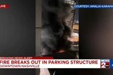 Multi-story carpark collapses as vehicles explode in roaring fire