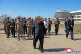 Kim Jong-un debuts fashionable new hat as he tours 'treasure island'