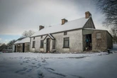 Spooky cottage 'frozen in time' from 1912 still has Titanic news clipping on table