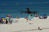 Brit holiday warning as 'towel police' launch drones to target sunbed hogs with £260 fines