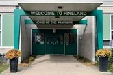 Female teacher, 88, accused of sexually abusing 5 students wheeled into court by husband