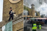 Major incident at Kings Cross station after man and dog climb 12ft clock tower