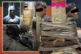 Truth behind mystery ‘Mexican Batman’ duct taping 'thieves' to lampposts