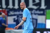 Footballer rushed to hospital with 'potentially life-threatening' injury after horror collision