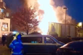 Major incident as blaze rages near station forcing 'whole street to be evacuated'